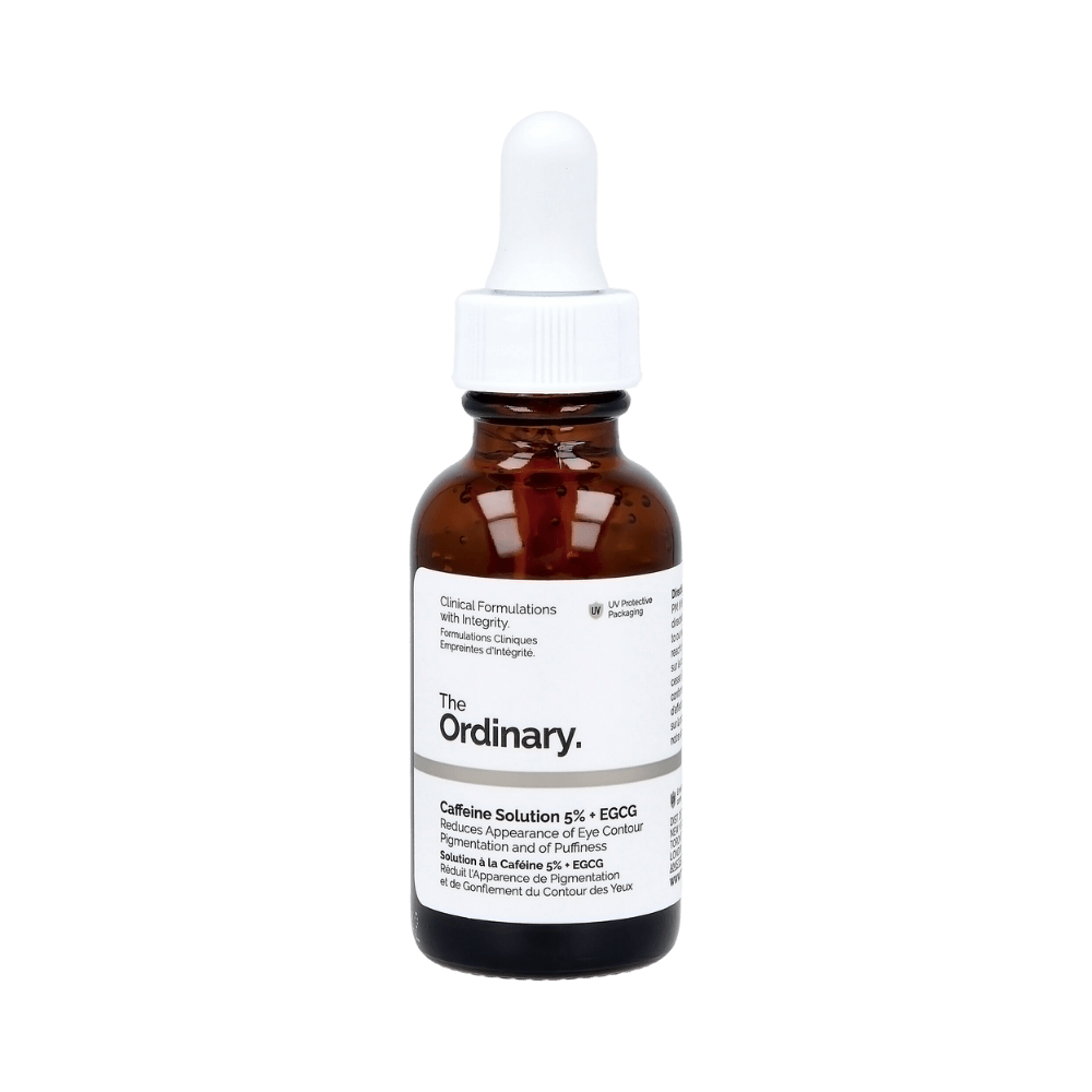 Brun flaska med vit etikett märkt The Ordinary Caffeine Solution 5% + EGCG, Clinical Formulations with Integrity, minskar uppkomsten av ögonkonturpigmentering och påsar, 30 ml.