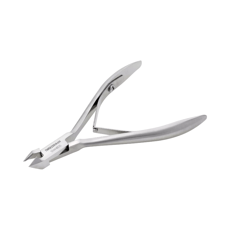 Tweezerman nagelbandstång i rostfritt stål med skarpa blad för effektiv borttagning av nagelband.