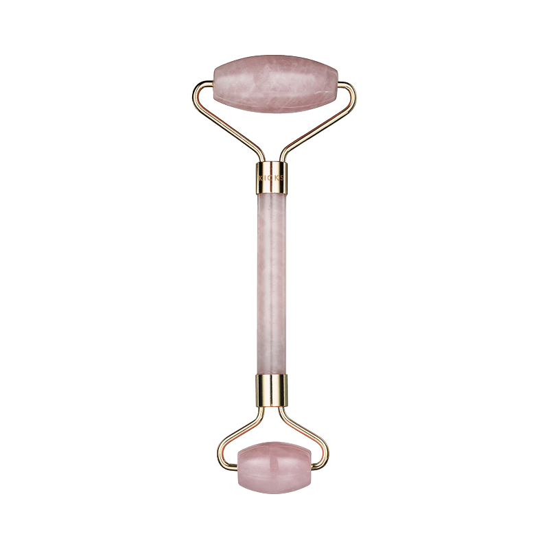 Rosa jade roller i rosékvarts för ansiktsmassage och lymfdränage.