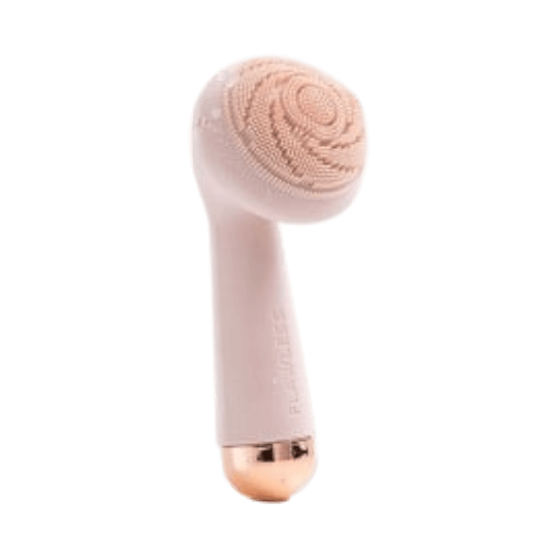 Flawless Cleanse ansiktsborste med mjuka silikonborst och ergonomiskt handtag.