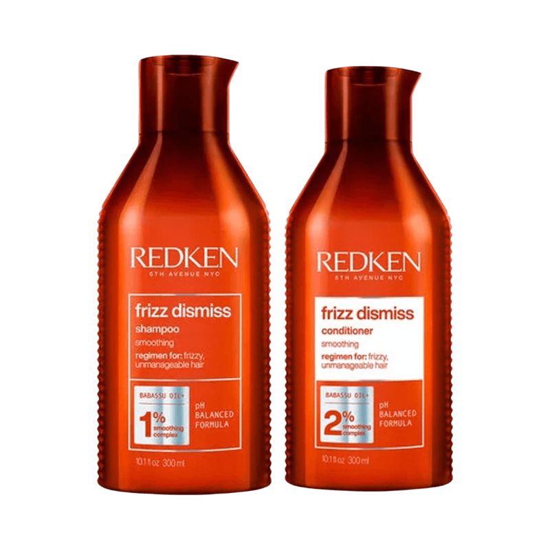 Redken Frizz Dismiss schampo och balsam i orange förpackning för frisskontroll.