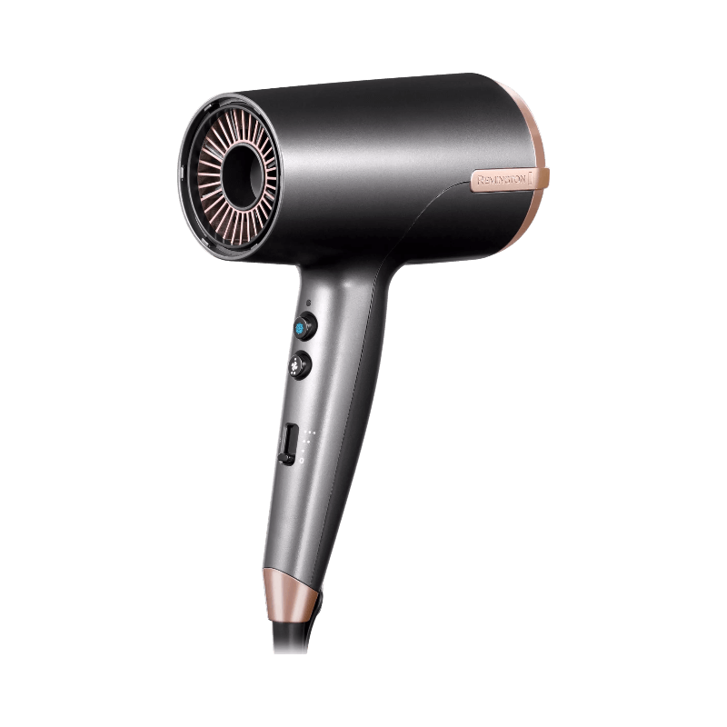 Rosa hårfön från Remington med munstycke och diffusor för skonsam styling.