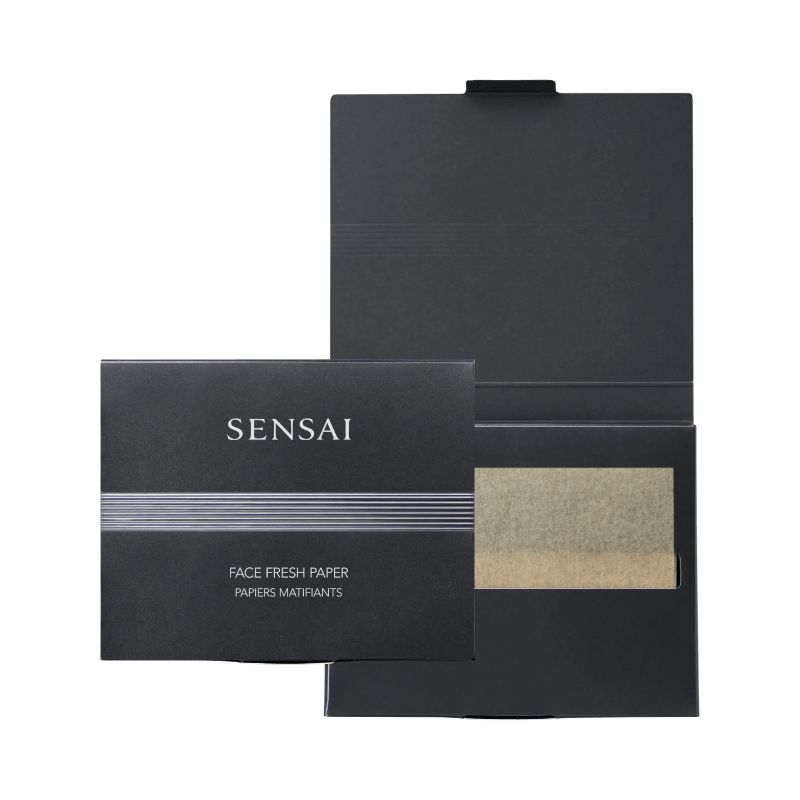 Lyxiga blotting papers från Sensai i elegant svart förpackning med silvriga ränder.
