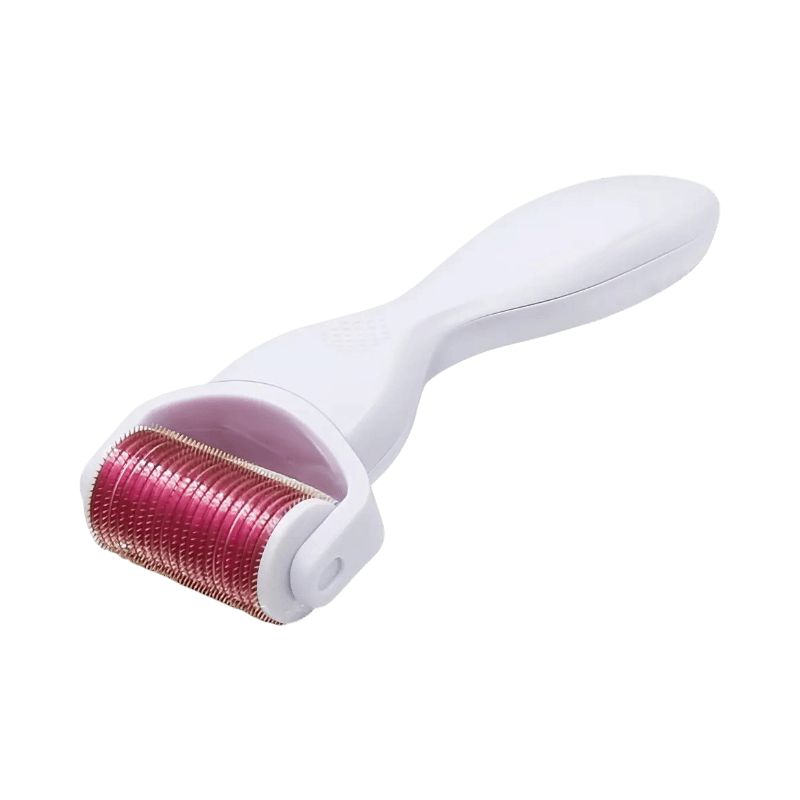 Vit Trendroller dermaroller med rosa nålhuvud för microneedling och hudförnyelse.