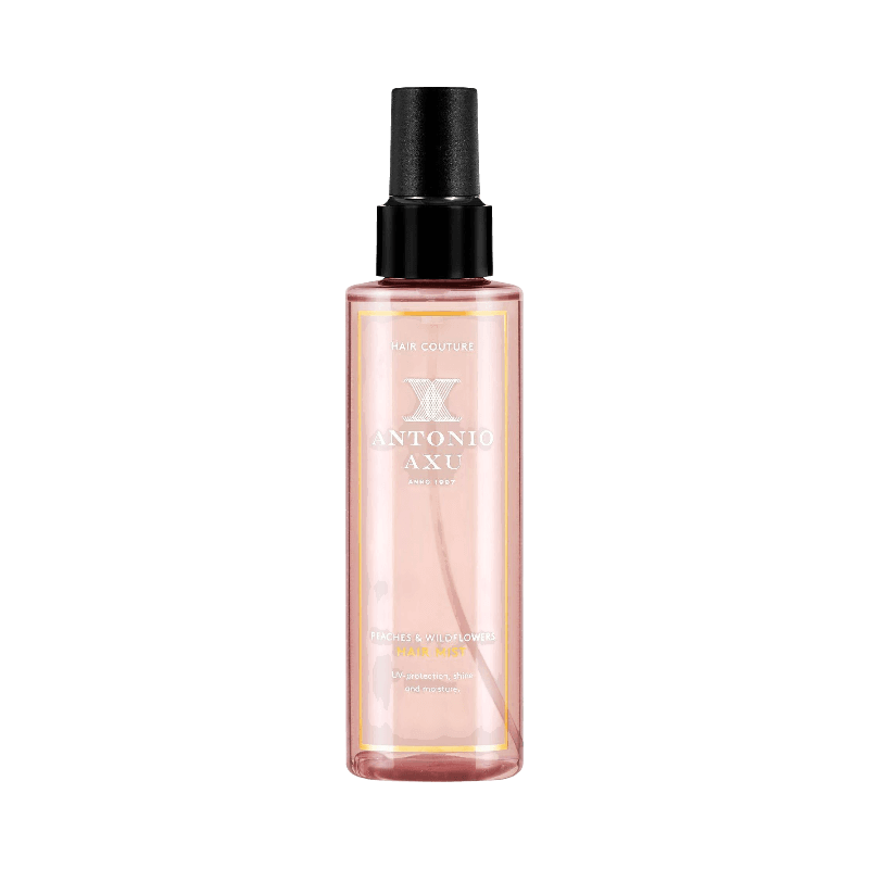 Antonio Axu Hair Mist med doft av persika och vildblommor som ger glans och fukt till håret.