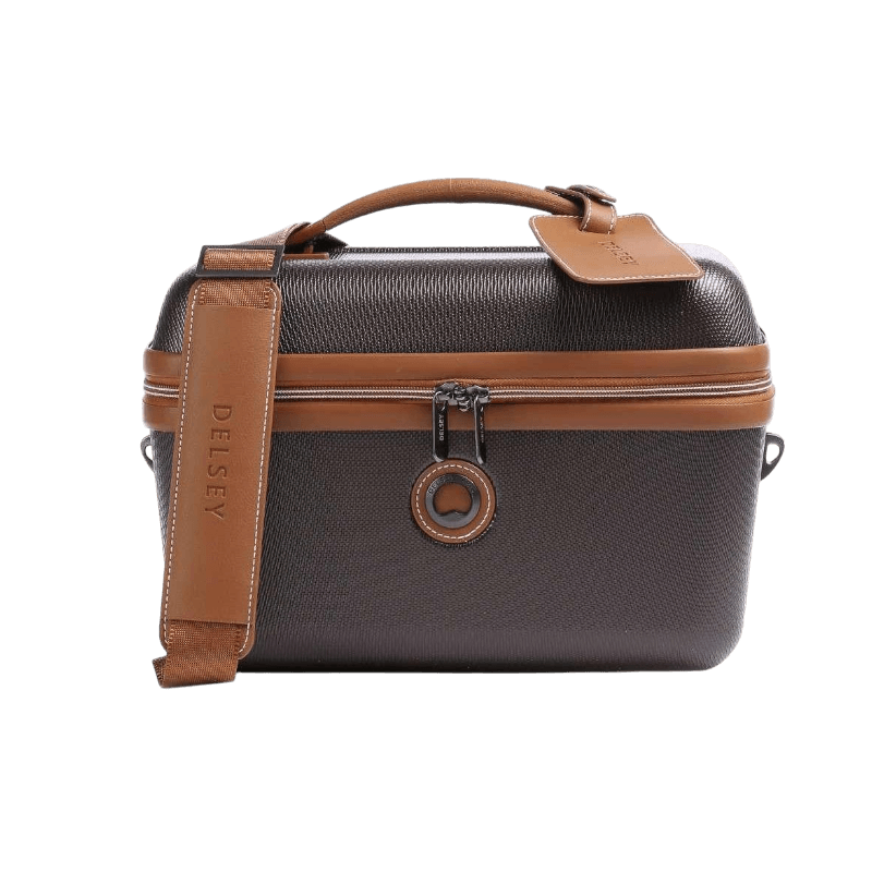 Elegant beauty case från Delsey med axelrem och läderdetaljer för stilren förvaring.