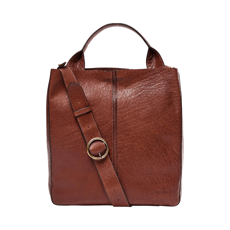 Brun tote bag i skinn från Saddler med rund spänndetalj på axelrem.