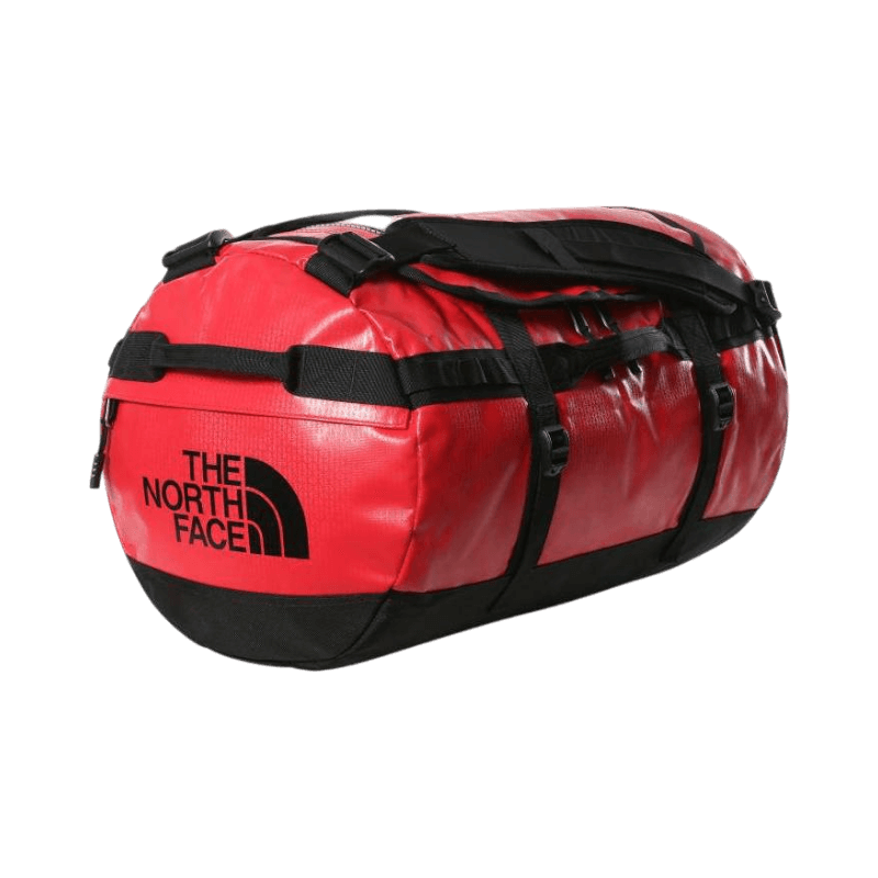 Röd duffelväska från The North Face med svarta detaljer och logotyp.